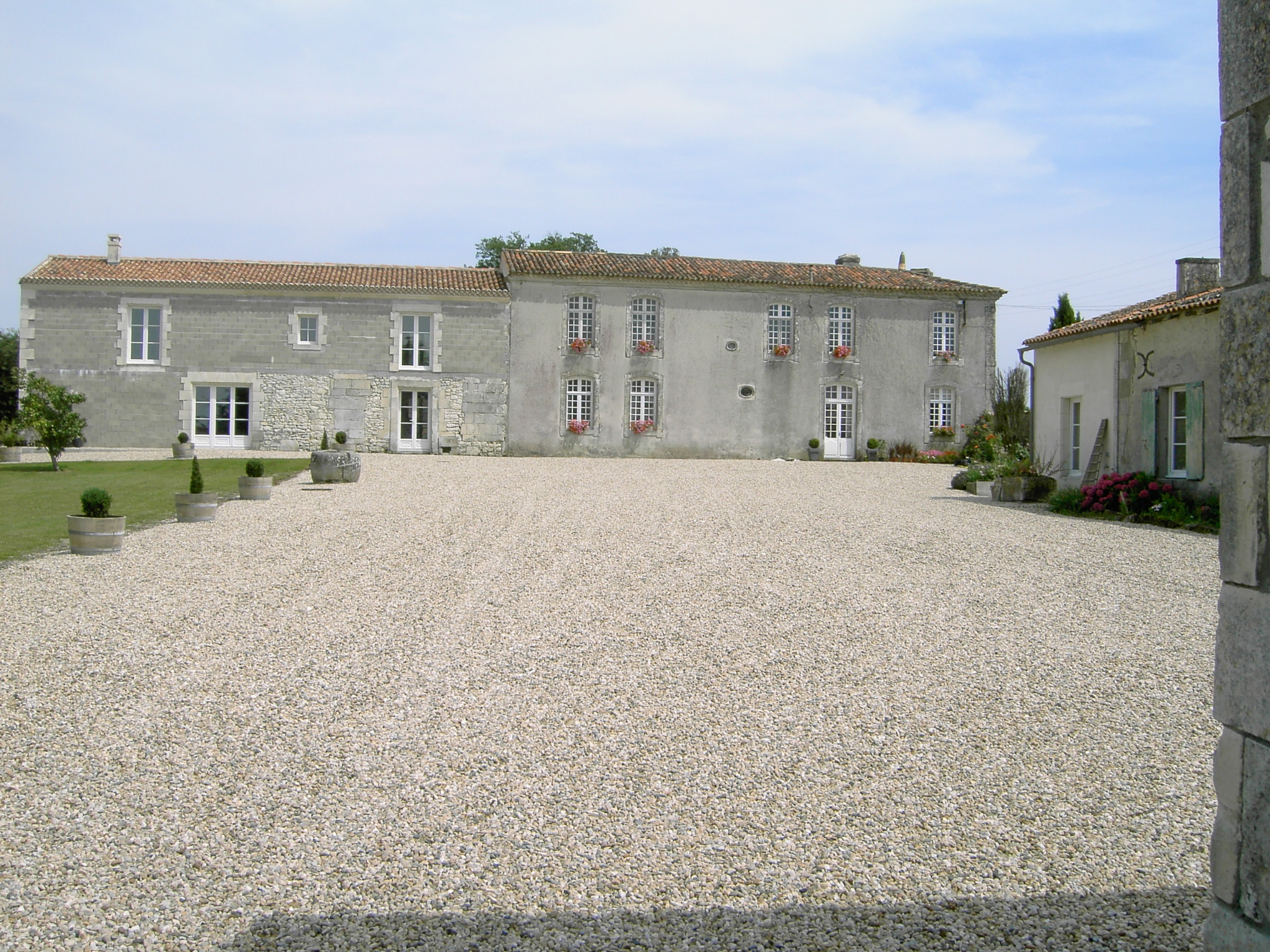View of courtyard and main house at Limorlin. The gîte is to the right